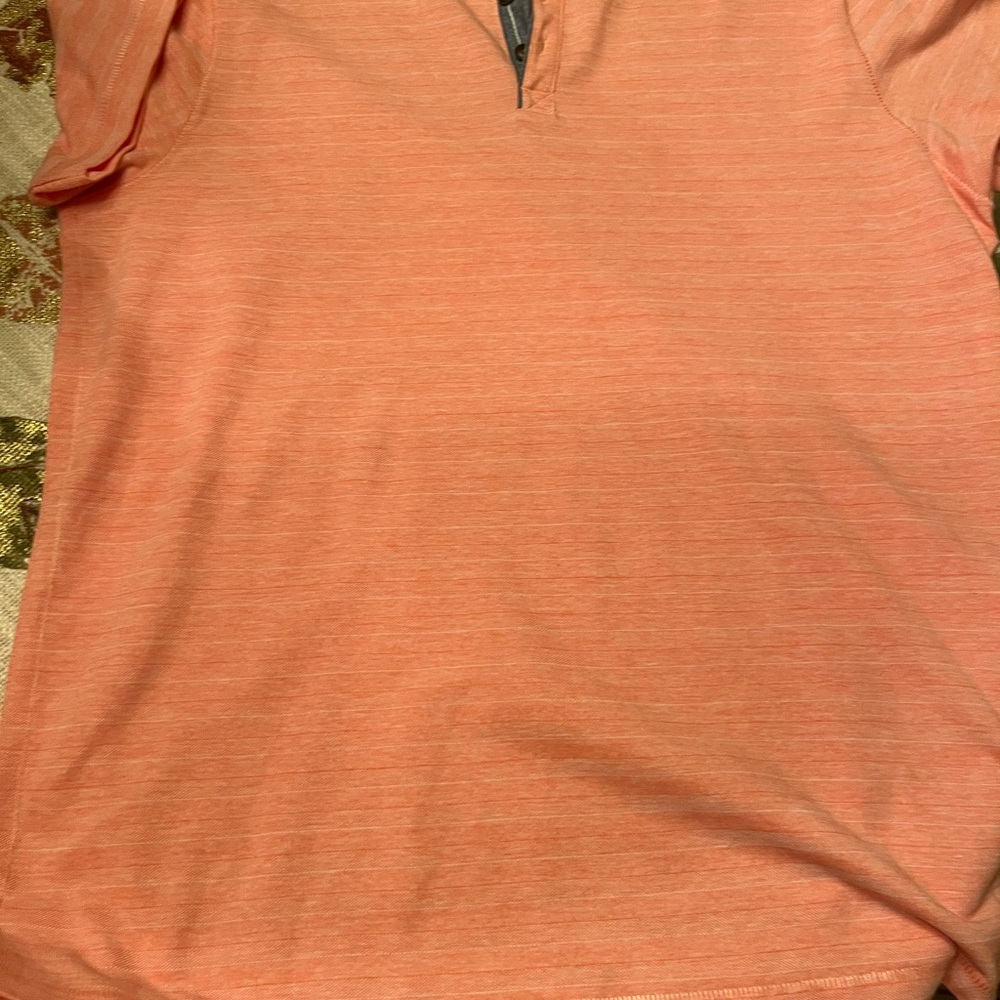 Orange men’s top. New and soft.
